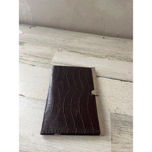 Brown and silver wallet style photo holder for 4x6 photos